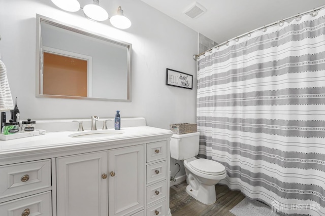 40 Nathan Dr, Old Bridge, NJ 08857 - bathroom featuring vanity, wood finished floors, and a shower with shower curtain