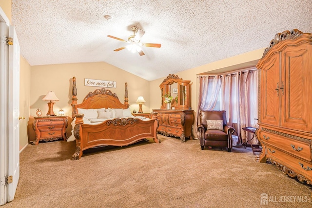 40 Nathan Dr, Old Bridge, NJ 08857 - bedroom featuring carpet, vaulted ceiling, a textured ceiling, and ceiling fan