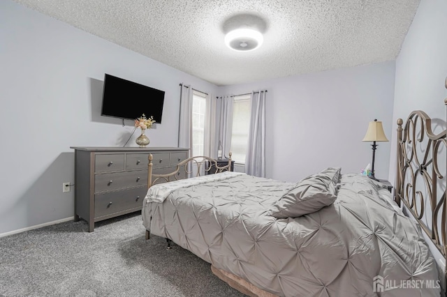 40 Nathan Dr, Old Bridge, NJ 08857 - carpeted bedroom featuring a textured ceiling and baseboards