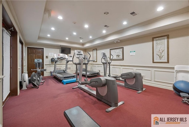 540 Cranbury Rd Unit 442, East Brunswick, NJ 08816 - exercise room featuring carpet flooring, a tray ceiling, recessed lighting, a wainscoted wall, and ornamental molding