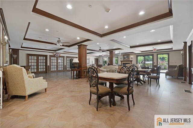 540 Cranbury Rd Unit 442, East Brunswick, NJ 08816 - dining area featuring ornate columns, french doors, ceiling fan, ornamental molding, and coffered ceiling