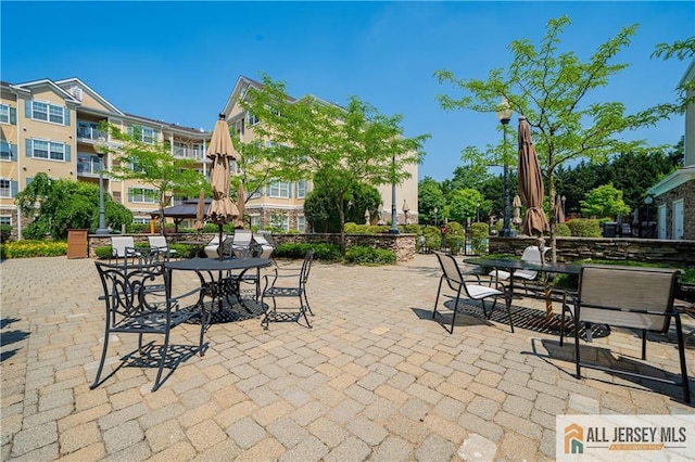 540 Cranbury Rd Unit 442, East Brunswick, NJ 08816 - view of patio featuring outdoor dining area