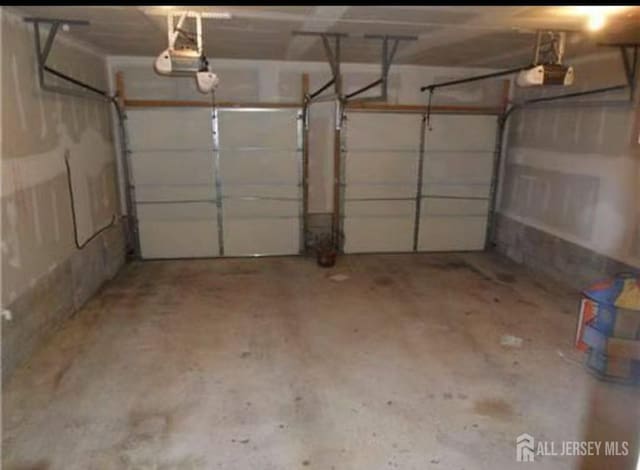 446 Great Beds Ct, Perth Amboy, NJ 08861 - garage with a garage door opener