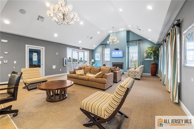 living area with lofted ceiling, an inviting chandelier, visible vents, and light colored carpet