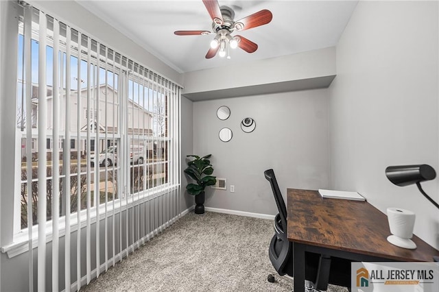 office with carpet floors, baseboards, and a ceiling fan