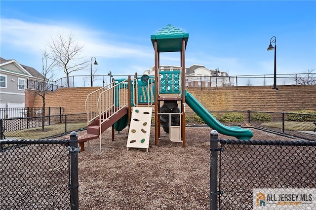 community playground featuring fence