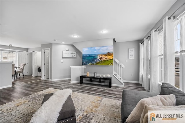 living room with stairs, recessed lighting, baseboards, and wood finished floors