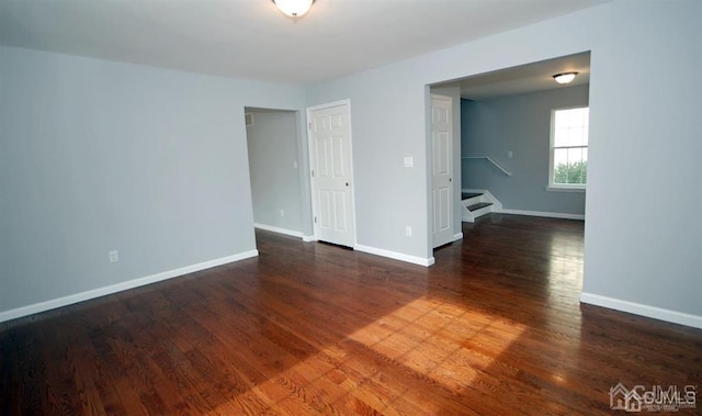 interior space with dark wood-type flooring