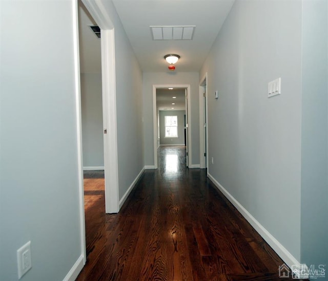 hall featuring dark hardwood / wood-style flooring