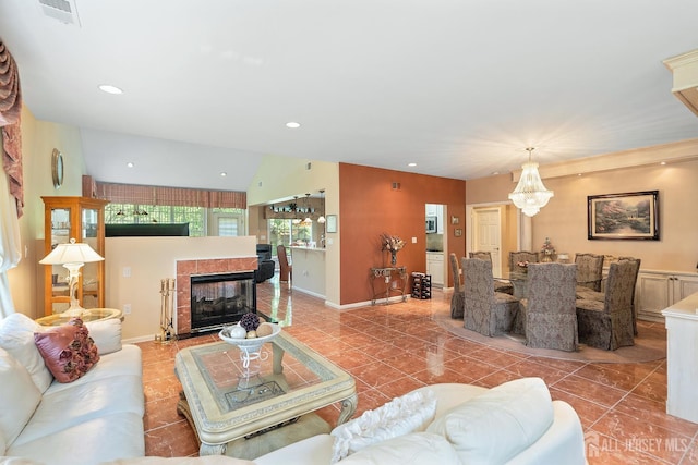 267 Tyler Ct, Monroe, NJ 08831 - tiled living room with a fireplace, recessed lighting, and a chandelier