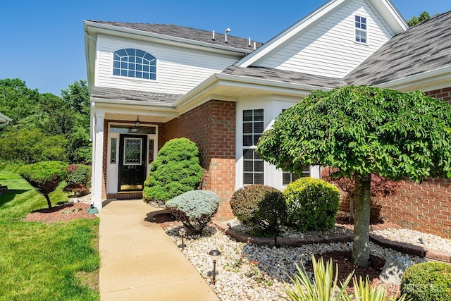 267 Tyler Ct, Monroe, NJ 08831 - view of front facade with brick siding and a shingled roof