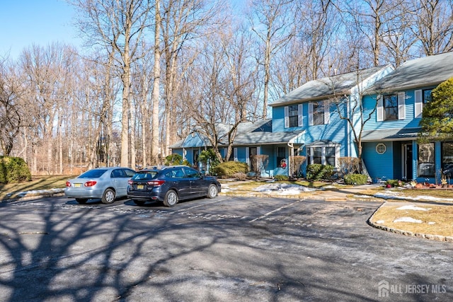 view of front of home with uncovered parking