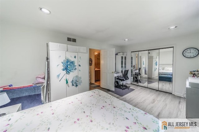 47 Pheasant Run Unit 47, Edison, NJ 08820 - bedroom with wood finished floors, recessed lighting, and a closet