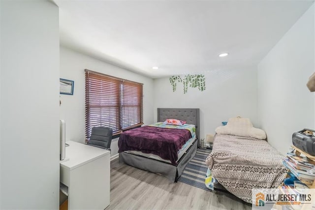 47 Pheasant Run Unit 47, Edison, NJ 08820 - bedroom with light wood-style flooring and recessed lighting