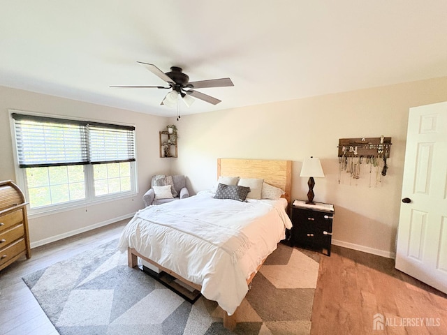 122 Arbor Way, Branchburg, NJ 08876 - bedroom featuring wood finished floors, baseboards, and a ceiling fan