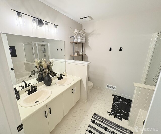 122 Arbor Way, Branchburg, NJ 08876 - full bathroom featuring a stall shower, a bath, toilet, double vanity, and tile patterned floors