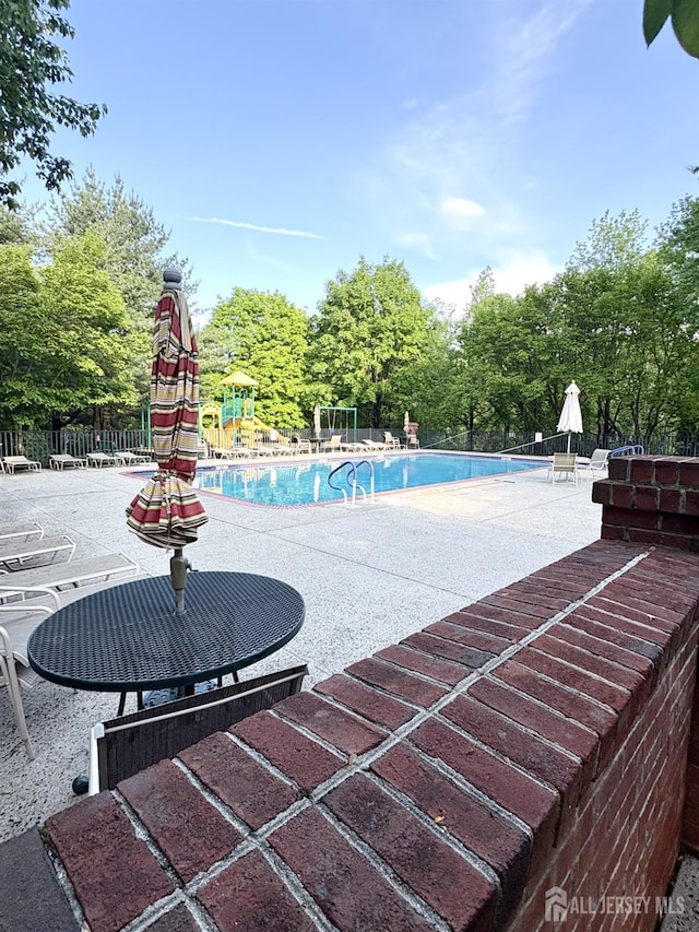 122 Arbor Way, Branchburg, NJ 08876 - community pool with a patio