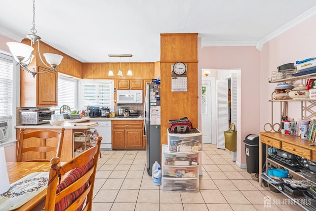 305 Penfield Pl, Dunellen, NJ 08812 - kitchen featuring white appliances, ornamental molding, light countertops, light tile patterned floors, and brown cabinets