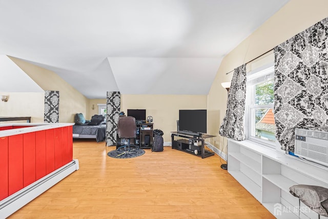 305 Penfield Pl, Dunellen, NJ 08812 - office area featuring a baseboard heating unit, vaulted ceiling, light wood-style floors, and healthy amount of natural light