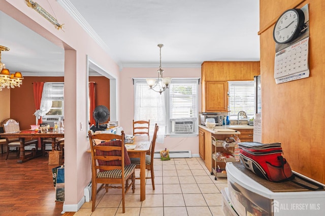 305 Penfield Pl, Dunellen, NJ 08812 - dining room with a chandelier, baseboard heating, cooling unit, crown molding, and light tile patterned floors