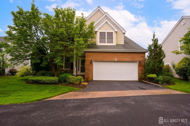 5 Fairmount Ct, Monroe, NJ 08831 - view of front of house featuring asphalt driveway, brick siding, a front lawn, and an attached garage