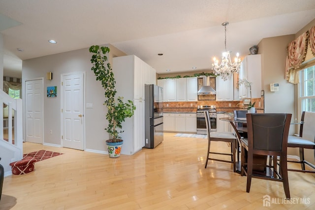 5 Fairmount Ct, Monroe, NJ 08831 - dining area with a chandelier, light wood-style floors, and recessed lighting
