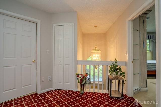 5 Fairmount Ct, Monroe, NJ 08831 - entrance foyer featuring a chandelier and baseboards