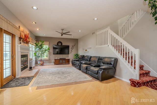 5 Fairmount Ct, Monroe, NJ 08831 - living area featuring stairway, a ceiling fan, recessed lighting, wood-type flooring, and a fireplace with flush hearth