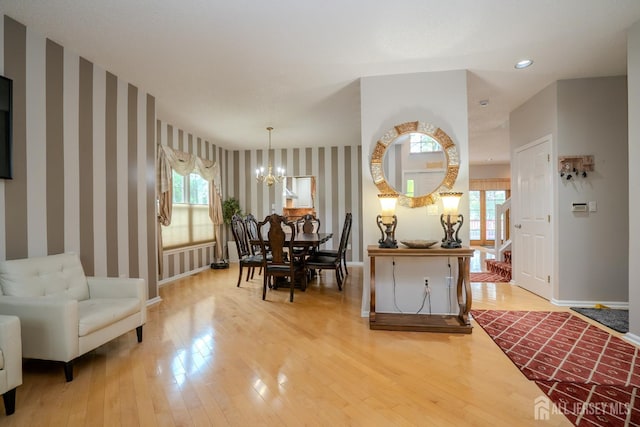 5 Fairmount Ct, Monroe, NJ 08831 - dining room with wallpapered walls, a chandelier, healthy amount of natural light, light wood-type flooring, and recessed lighting