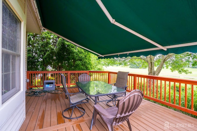 5 Fairmount Ct, Monroe, NJ 08831 - wooden terrace with outdoor dining area