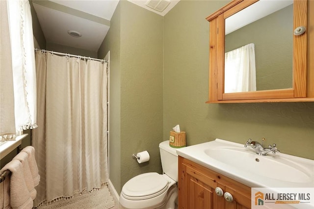 241 E Chestnut Ave, Metuchen, NJ 08840 - bathroom with vanity, toilet, a textured wall, and a shower with curtain