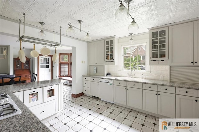241 E Chestnut Ave, Metuchen, NJ 08840 - kitchen featuring a sink, dishwasher, healthy amount of natural light, an ornate ceiling, and stainless steel gas cooktop