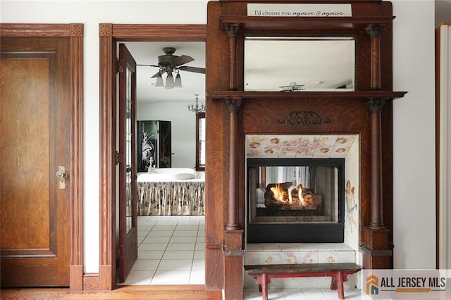 241 E Chestnut Ave, Metuchen, NJ 08840 - detailed view of a ceiling fan and a multi sided fireplace