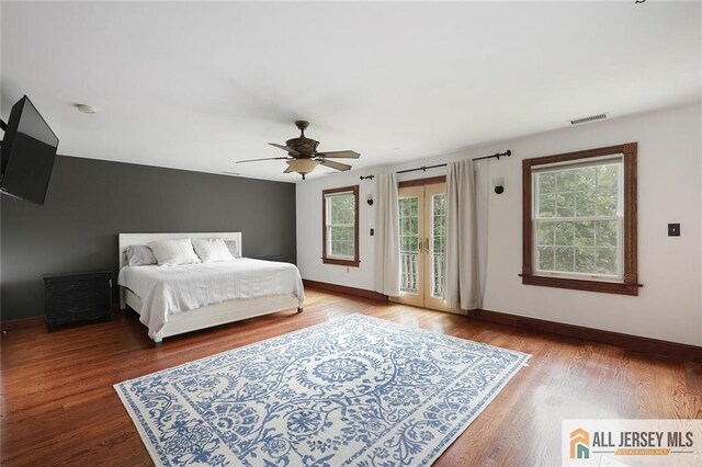 241 E Chestnut Ave, Metuchen, NJ 08840 - bedroom featuring access to outside, baseboards, and wood finished floors