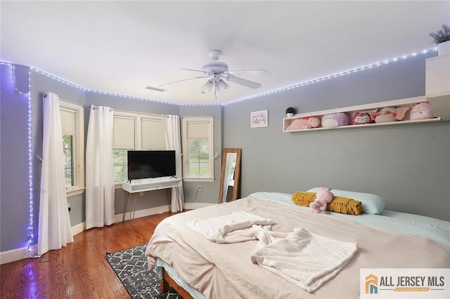 241 E Chestnut Ave, Metuchen, NJ 08840 - bedroom with wood finished floors and a ceiling fan