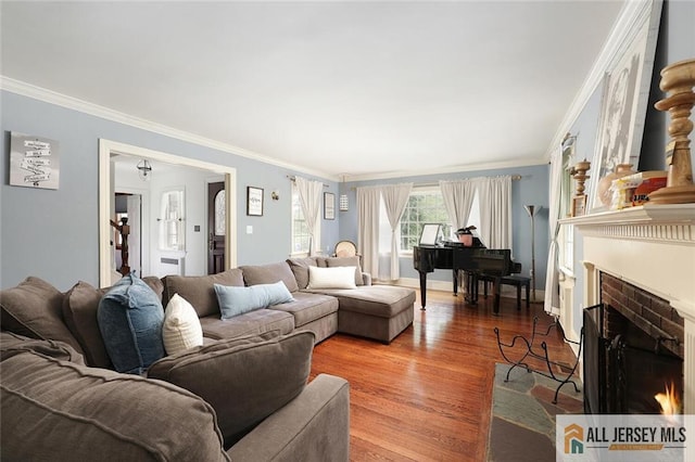 241 E Chestnut Ave, Metuchen, NJ 08840 - living room featuring crown molding, a fireplace with flush hearth, and wood finished floors