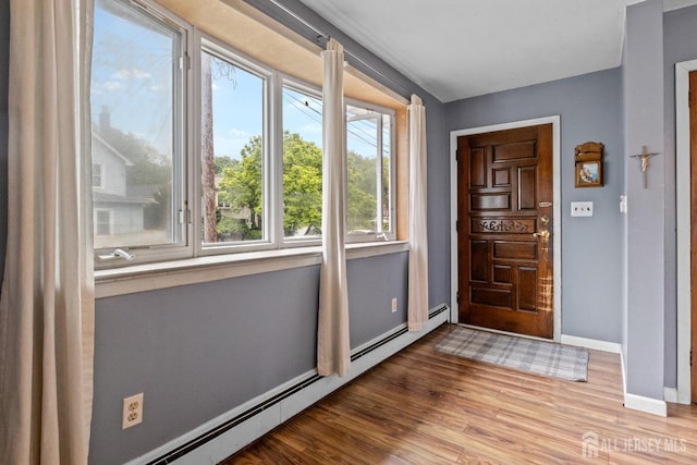 15 Cutter Ave, Fords, NJ 08863 - foyer featuring a baseboard radiator, baseboards, and wood finished floors