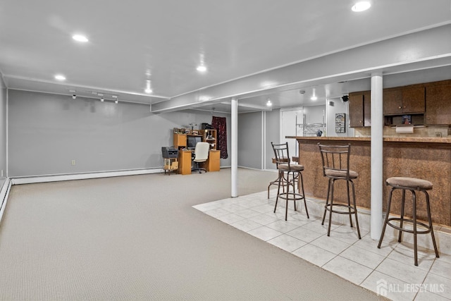 15 Cutter Ave, Fords, NJ 08863 - finished below grade area with baseboard heating, bar area, recessed lighting, and light tile patterned floors
