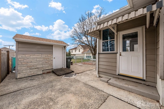 garage featuring fence