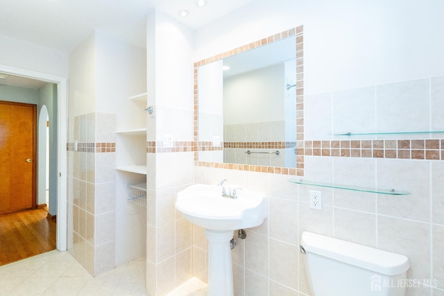 2624 Tremley Point Rd, Linden, NJ 07036 - half bathroom with tile walls and toilet
