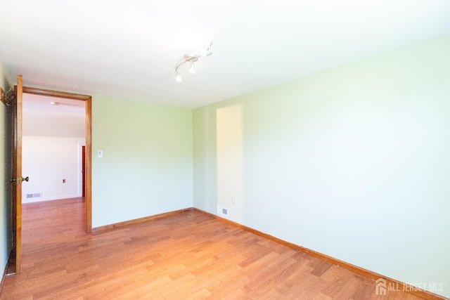 2624 Tremley Point Rd, Linden, NJ 07036 - spare room with light wood finished floors and baseboards