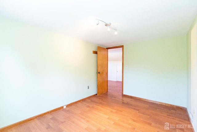 2624 Tremley Point Rd, Linden, NJ 07036 - unfurnished room featuring light wood-style flooring and baseboards