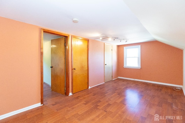 2624 Tremley Point Rd, Linden, NJ 07036 - bonus room with wood finished floors, baseboards, and vaulted ceiling