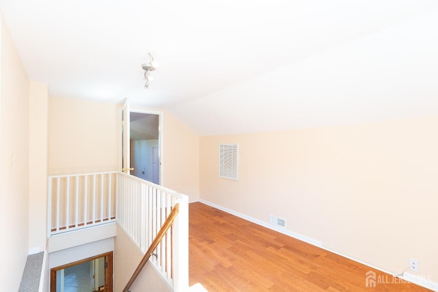 2624 Tremley Point Rd, Linden, NJ 07036 - bonus room with light wood finished floors, lofted ceiling, and baseboards