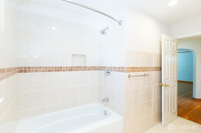 2624 Tremley Point Rd, Linden, NJ 07036 - full bath featuring tile walls, shower / bathtub combination, and tile patterned flooring