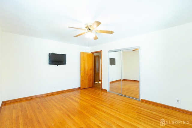 2624 Tremley Point Rd, Linden, NJ 07036 - unfurnished bedroom with a closet, baseboards, light wood-type flooring, and ceiling fan