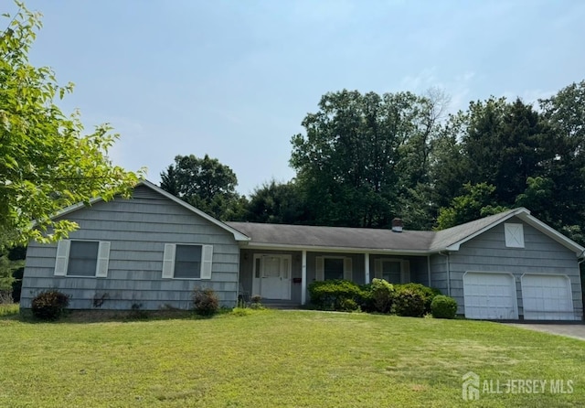 26 Thrush Dr, East Brunswick, NJ 08816 - ranch-style home featuring an attached garage, a front yard, and asphalt driveway