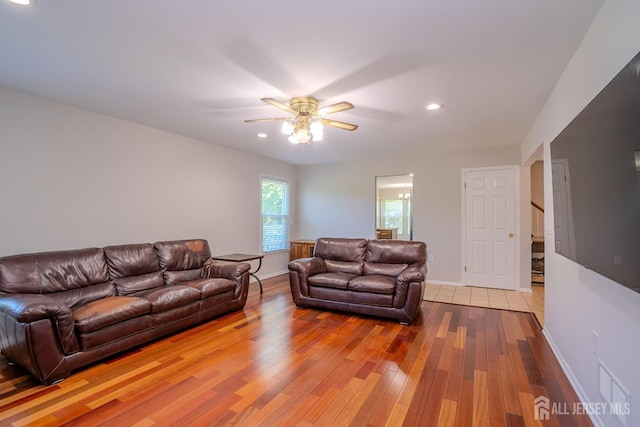 55 Cambridge Way, West Windsor, NJ 08550 - living room featuring light wood finished floors, ceiling fan, stairs, recessed lighting, and baseboards