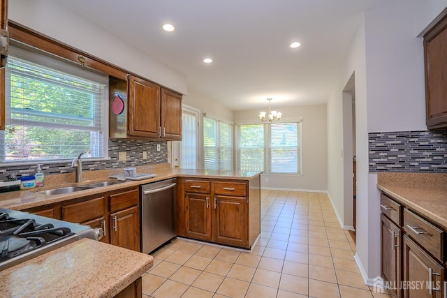 55 Cambridge Way, West Windsor, NJ 08550 - kitchen with dishwasher, a sink, tasteful backsplash, a peninsula, and light tile patterned floors