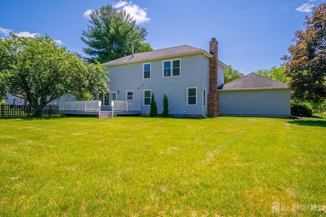 55 Cambridge Way, West Windsor, NJ 08550 - rear view of property with a chimney and a deck